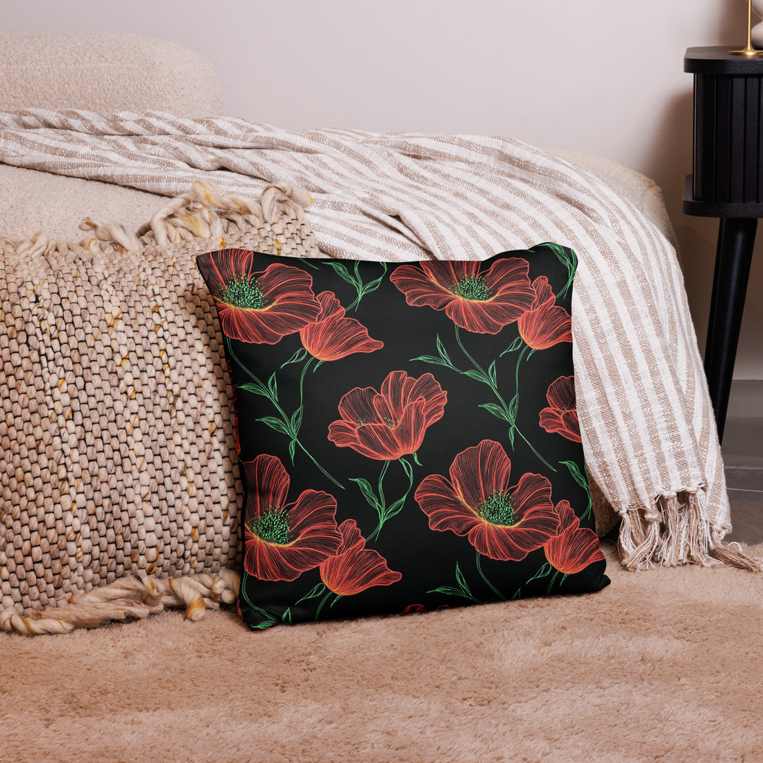 Floral Coral Poppy Accent Pillow with vibrant red poppies on a black background, enhancing winter decor.