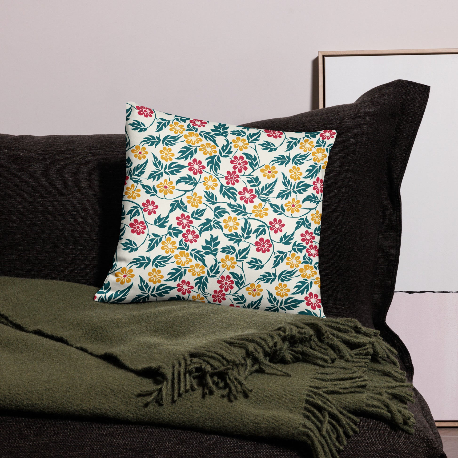 Vibrant floral pillow with red, yellow, green botanical design on polyester fabric.