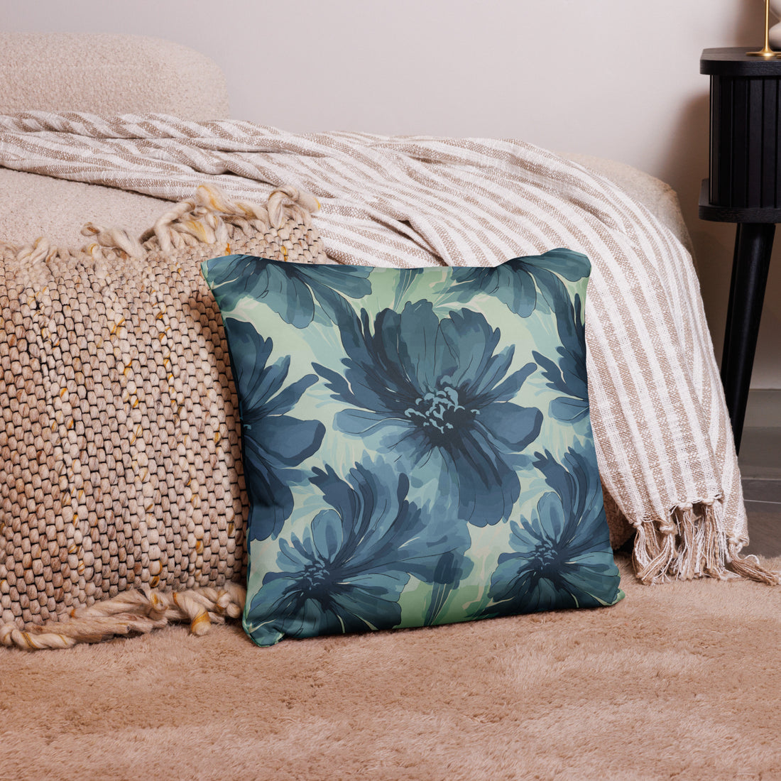 Luxurious pillow featuring an azure blue peony floral design with a soft knitted texture, perfect for winter decor.