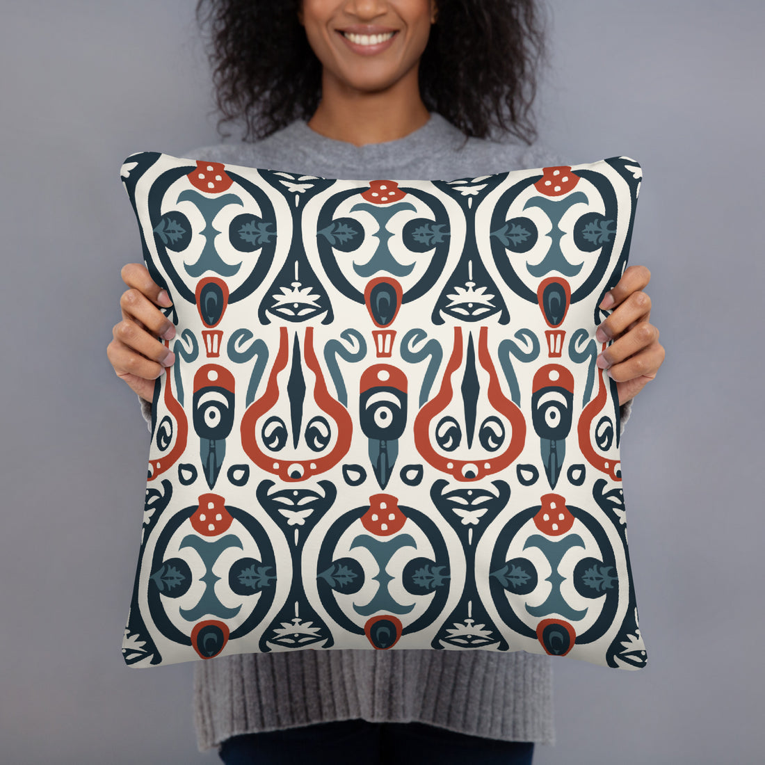 Pillow featuring Nordic owl pattern with navy and rust colors, knitted design