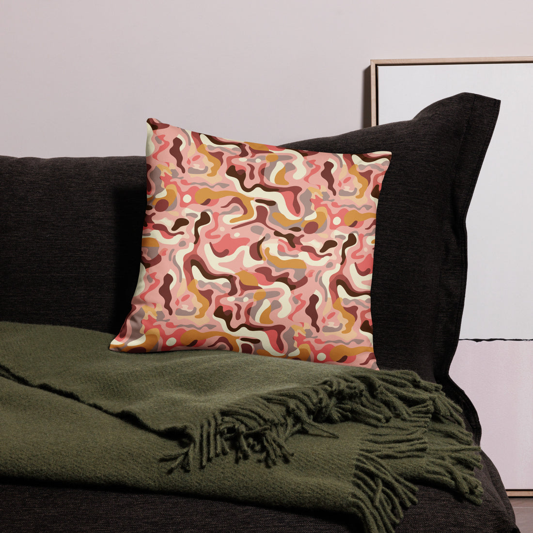 Knitted pillowcase featuring an autumn camouflage design in copper, pink, and cream hues, with a machine-washable polyester cover and shape-retaining insert.