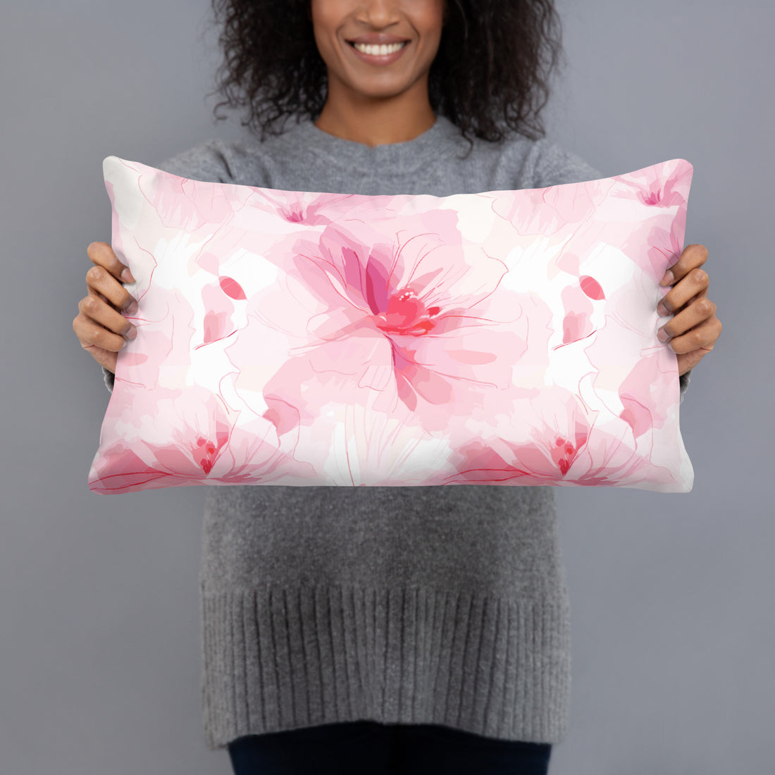 Pillow with pink floral design featuring soft hues and intricate floral patterns promoting winter elegance.