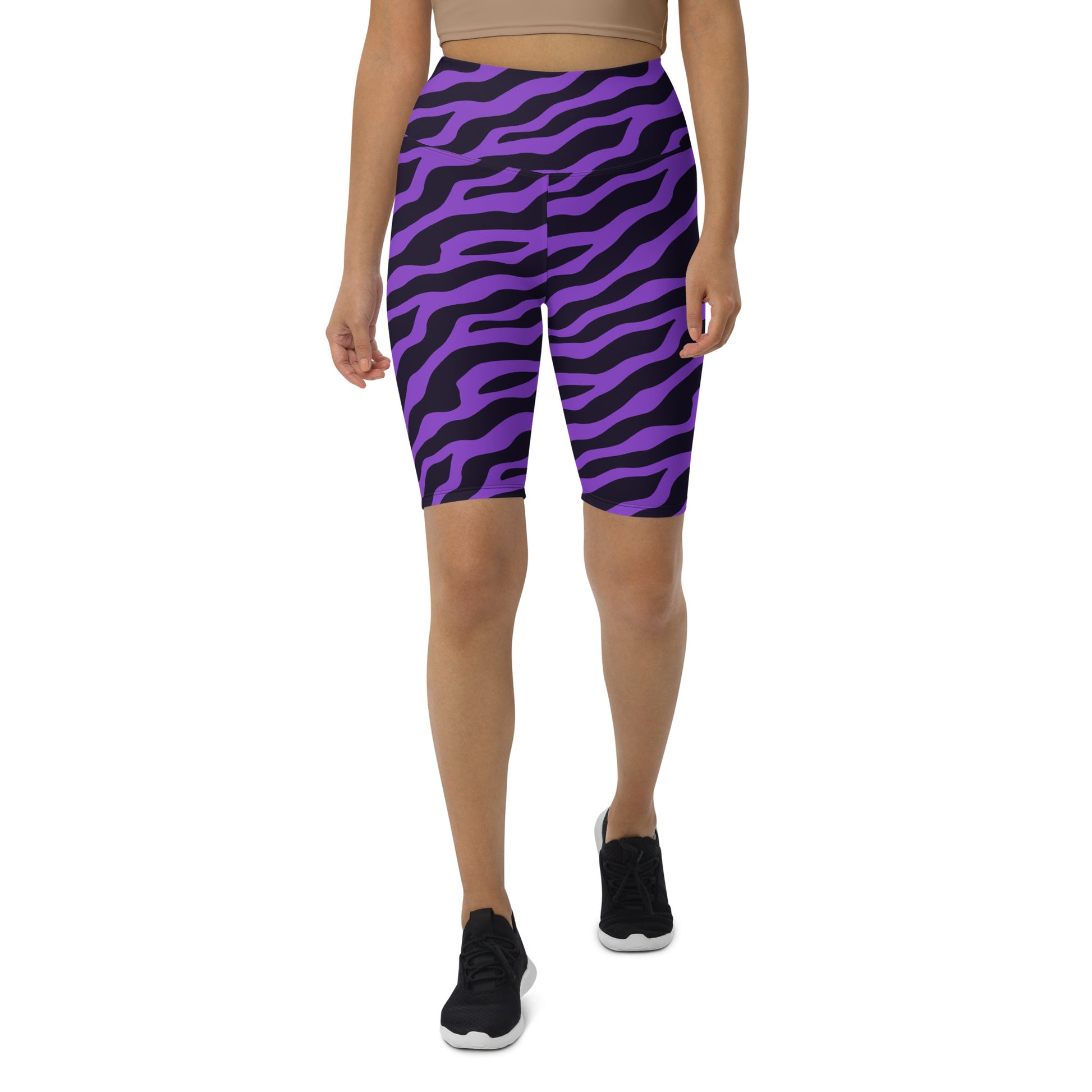 High-waisted purple zebra print biker shorts with a flattering cut, featuring a double-layered waistband and stylish design.