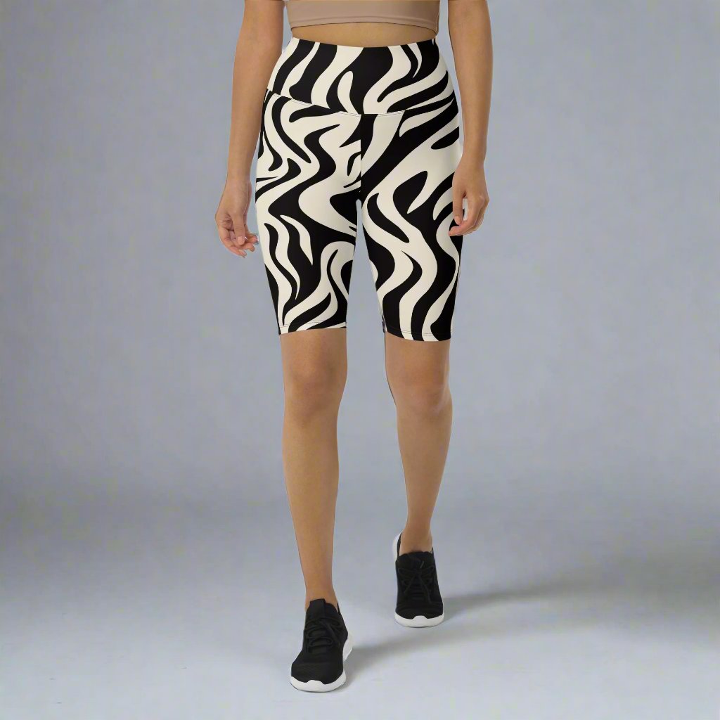 High-waisted biker shorts featuring an abstract black and white pattern, designed for comfort and style.