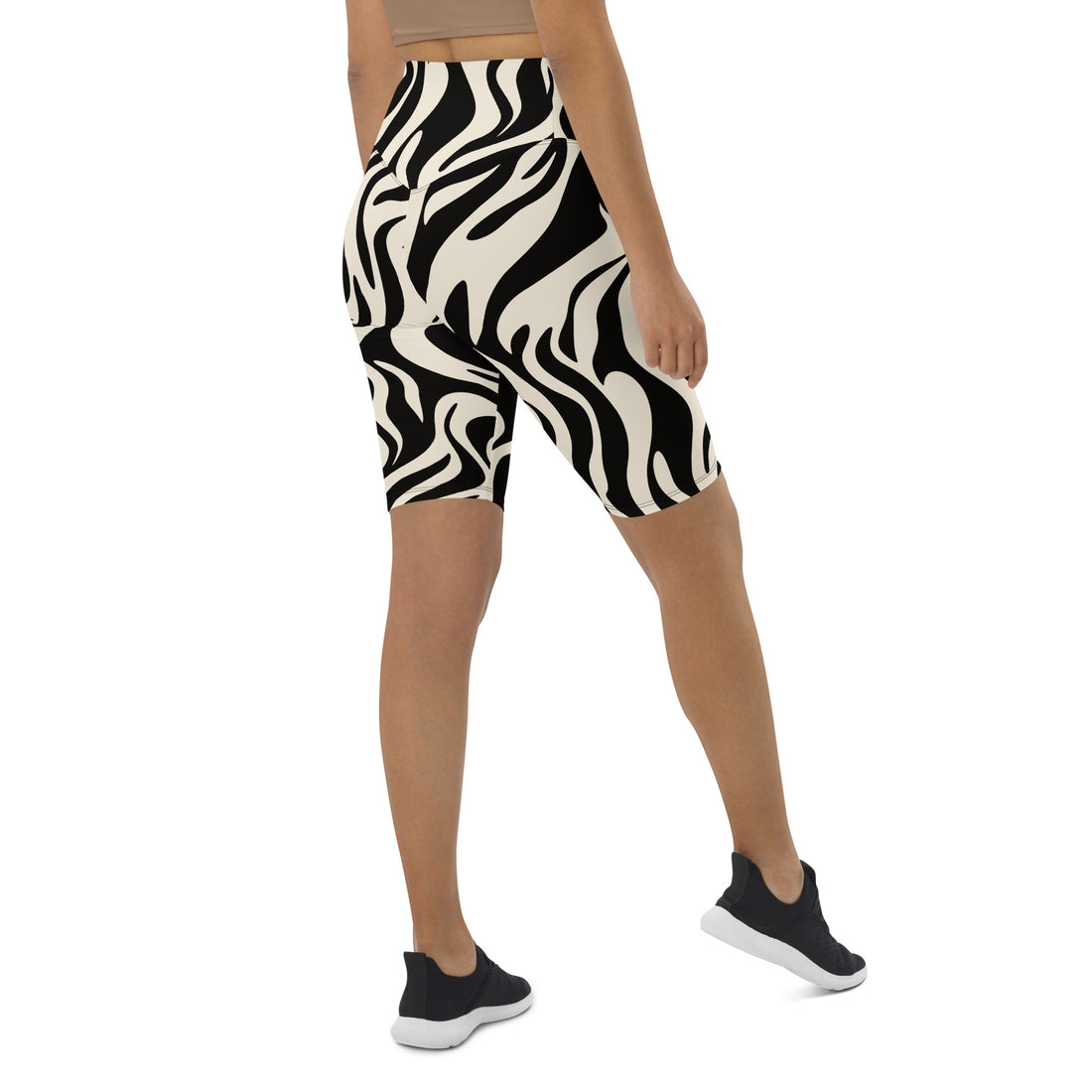 High-waisted biker shorts featuring an abstract black and white pattern, designed for comfort and style.