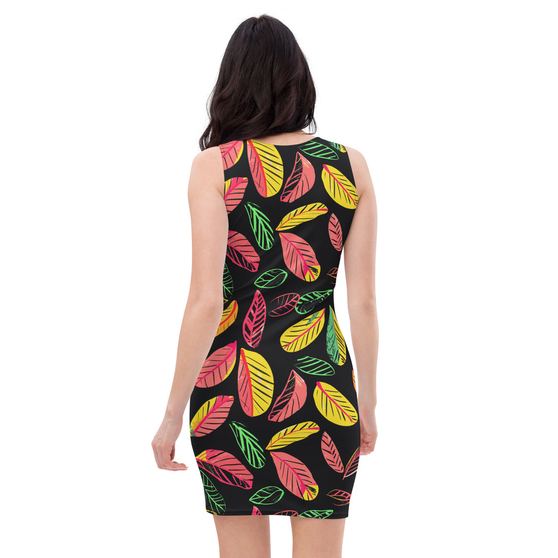 A model wearing a tropical leaf printed bodycon dress featuring vibrant pink, yellow, and green leaves on a black background.