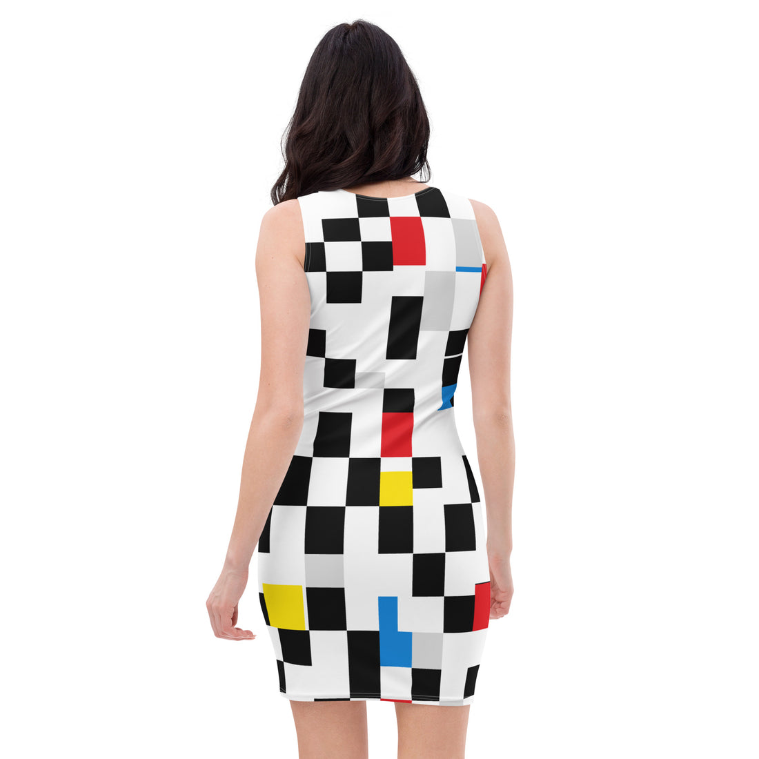 Woman wearing bodycon dress with bold black, red, yellow, and blue geometric color block design