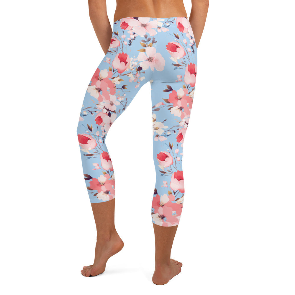 Capri leggings with pastel blossom floral design in pink, white, and blue hues, featuring comfortable microfiber fabric ideal for spring fashion.