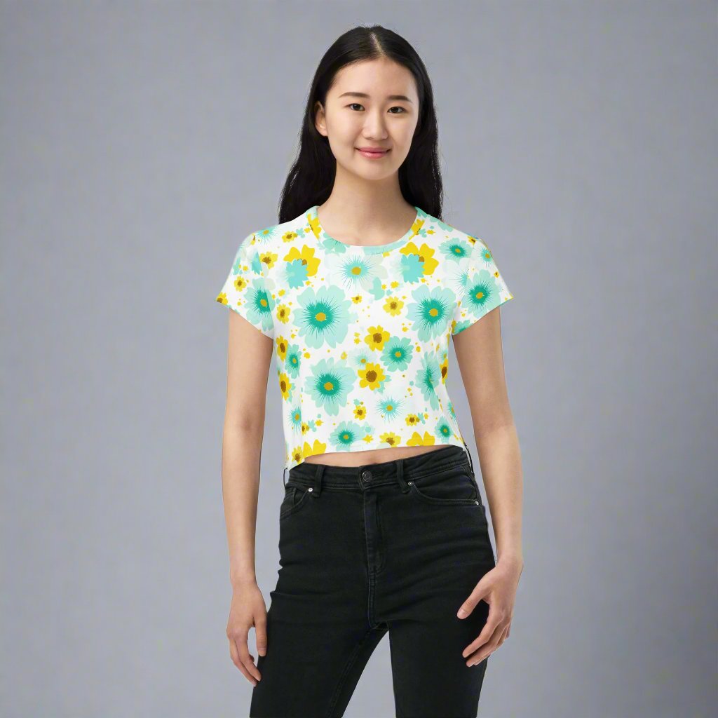 Floral Print Crop Tee in vibrant turquoise and yellow colors with a model wearing it.