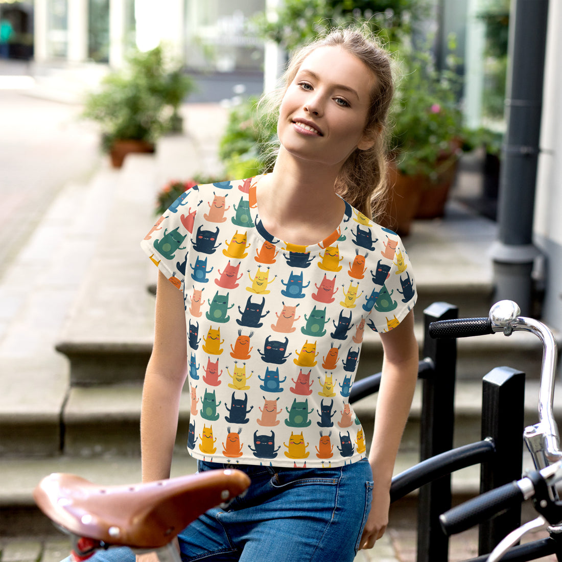 Halloween-themed all-over print crop tee for women with colorful spooky characters.