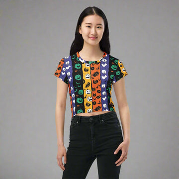 Halloween-themed crop tee featuring colorful designs of pumpkins, ghosts, and bats in vibrant colors.