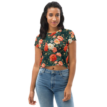 Eco-friendly floral crop tee featuring vibrant roses on a deep green background, perfect for winter fashion.