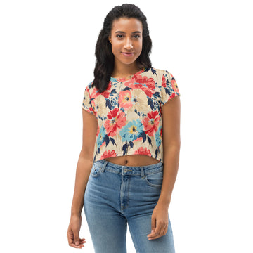 Eco-friendly floral print crop tee featuring vibrant red and blue flowers on a beige background, perfect for winter fashion.