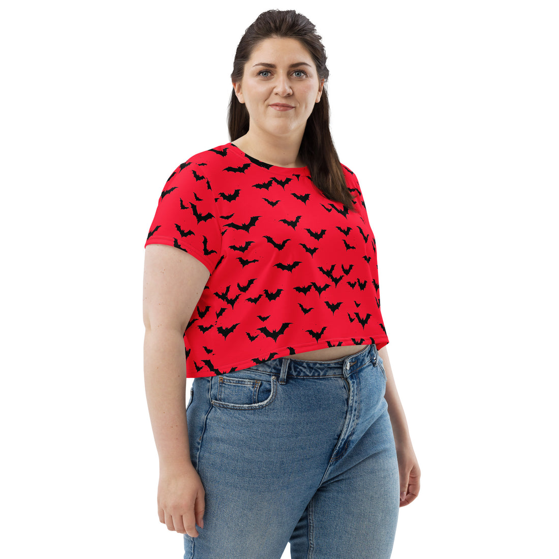 A vibrant red crop tee featuring a playful bat print, perfect for Halloween.