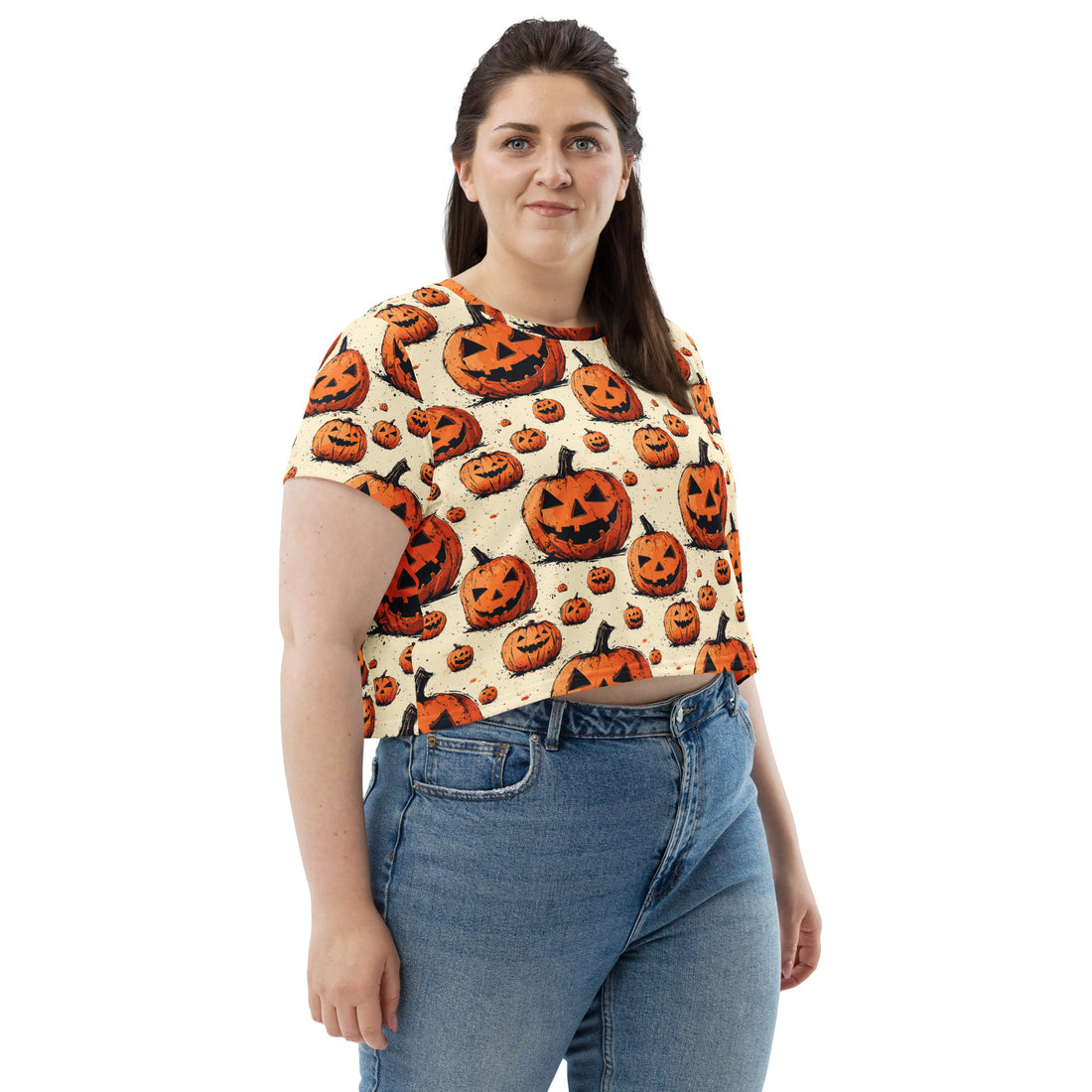 Halloween Pumpkin Print Crop Tee featuring a vibrant design with whimsical pumpkins against a cream background, perfect for festive celebrations.