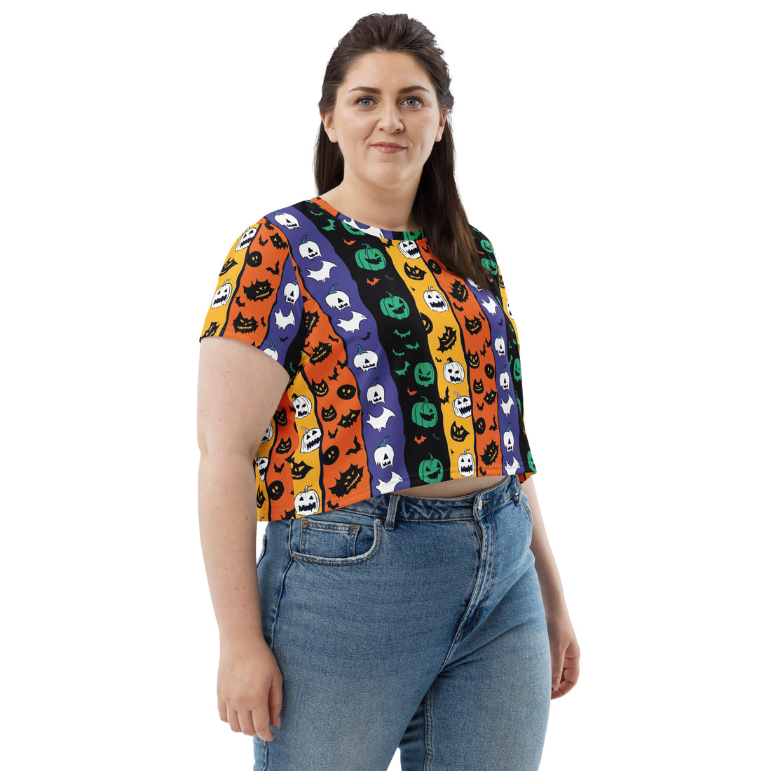 Halloween-themed crop tee featuring colorful designs of pumpkins, ghosts, and bats in vibrant colors.