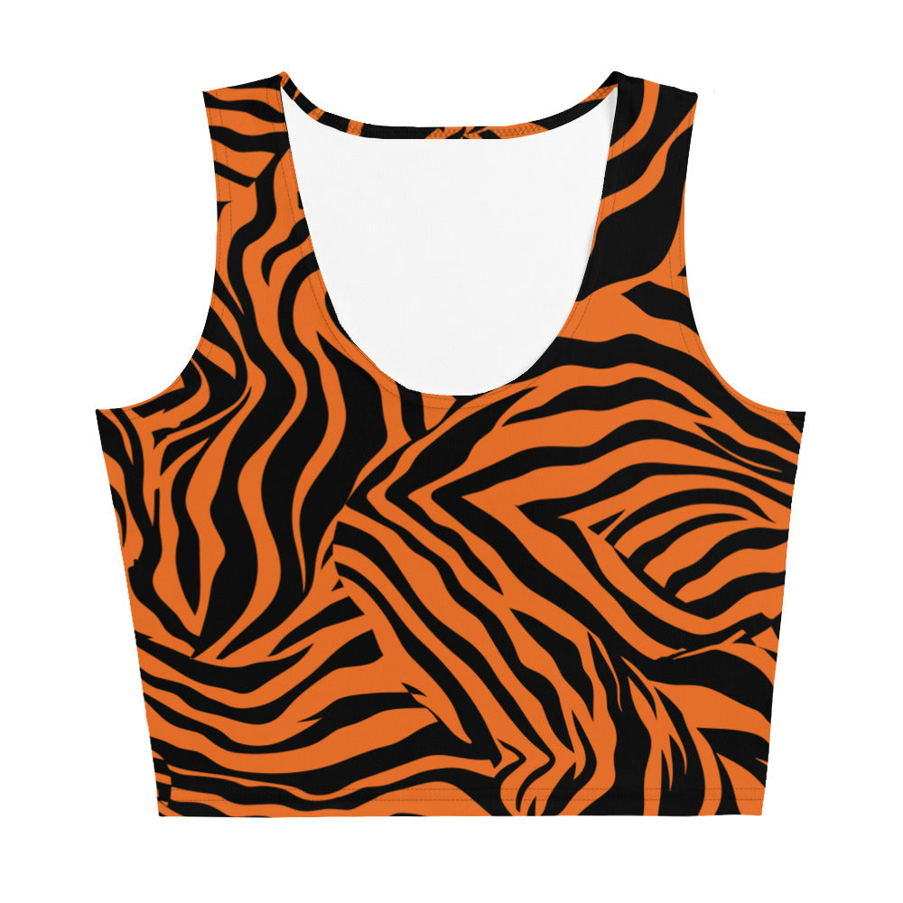 Model wearing a body-hugging crop top with vibrant tiger stripes in orange and black.