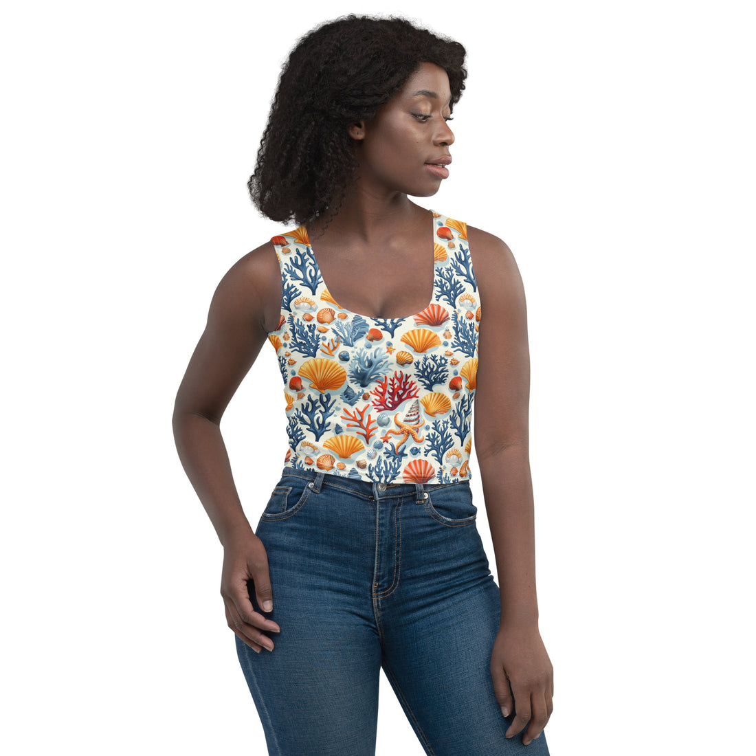 Women's crop top featuring a vibrant coral reef sea life design with bold, colorful hues ideal for holiday fashion.