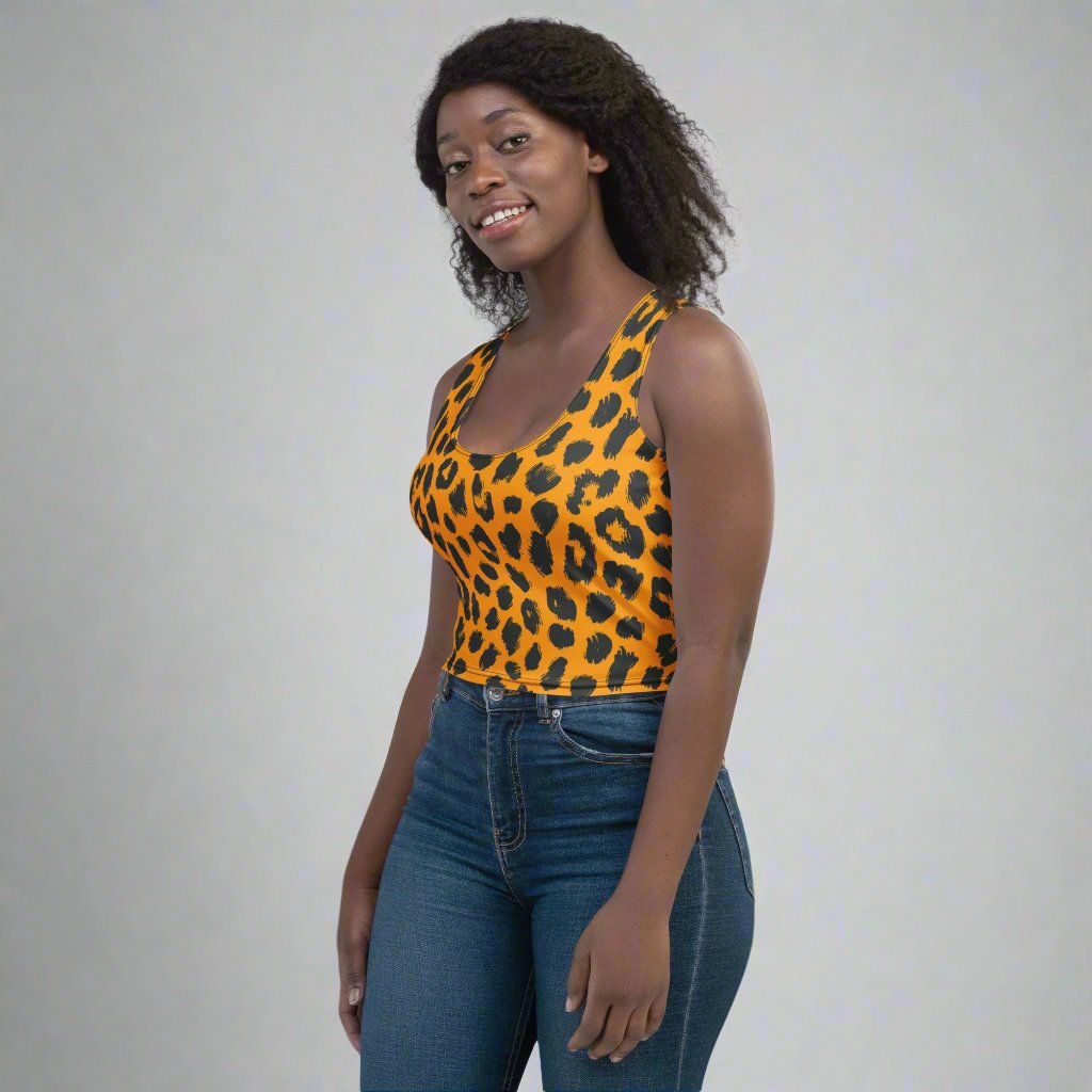 Leopard print crop top in vibrant orange and black, designed for a flattering fit.