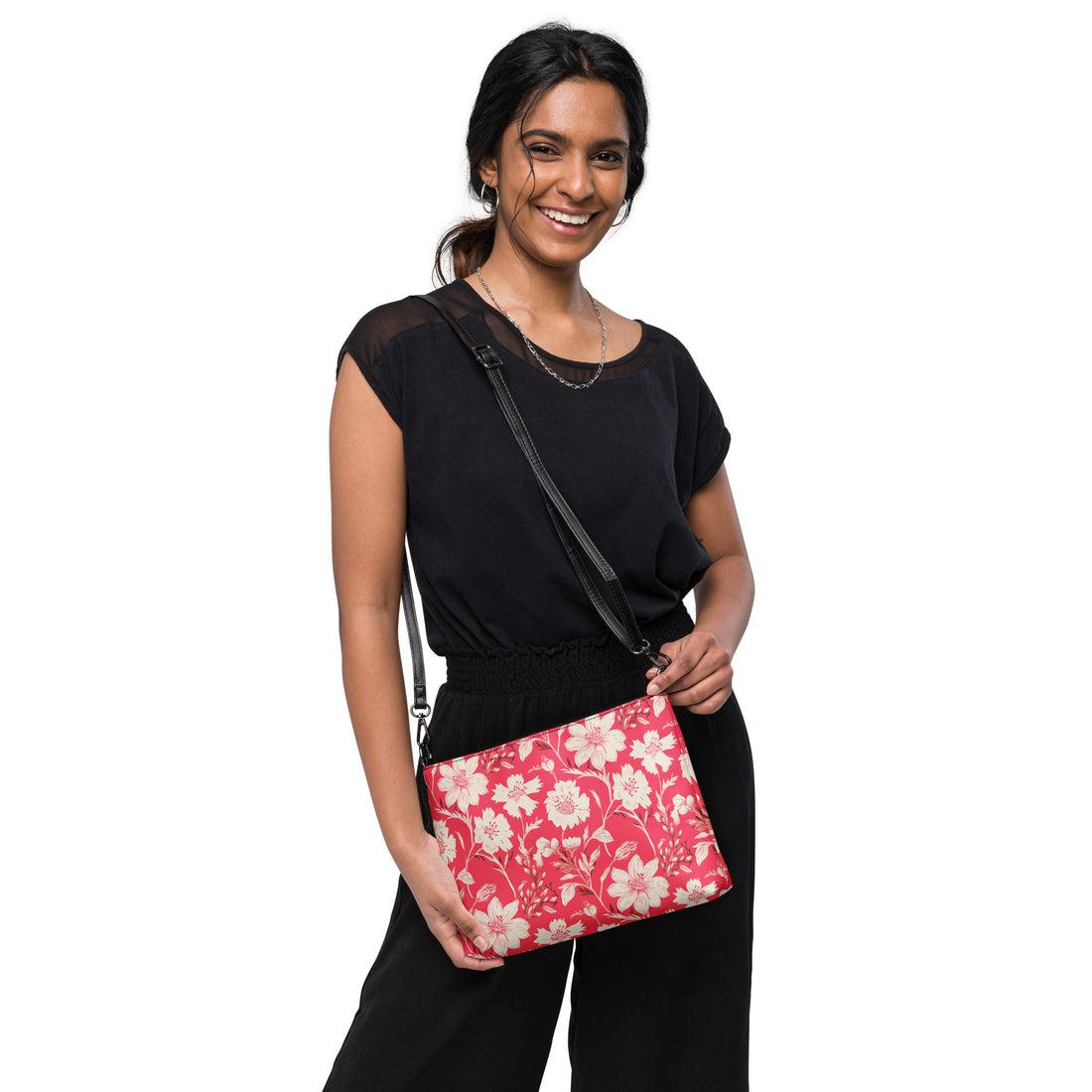 Floral Print Crossbody Bag in vibrant pink and cream colors with dark gray hardware and adjustable strap.