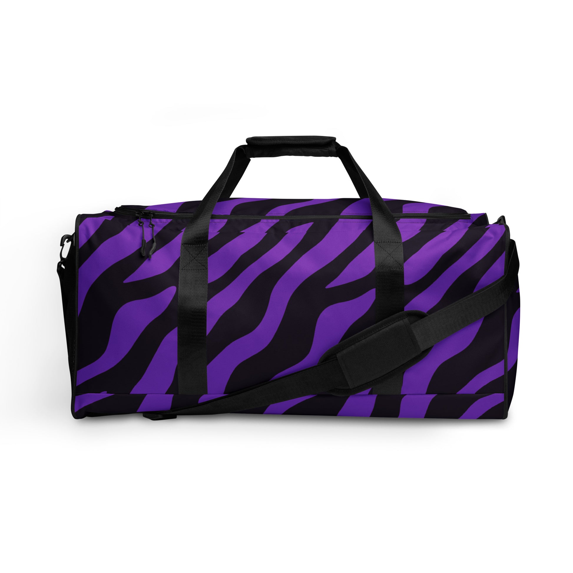 Bold zebra print duffle bag in purple and black with adjustable strap and double handles.