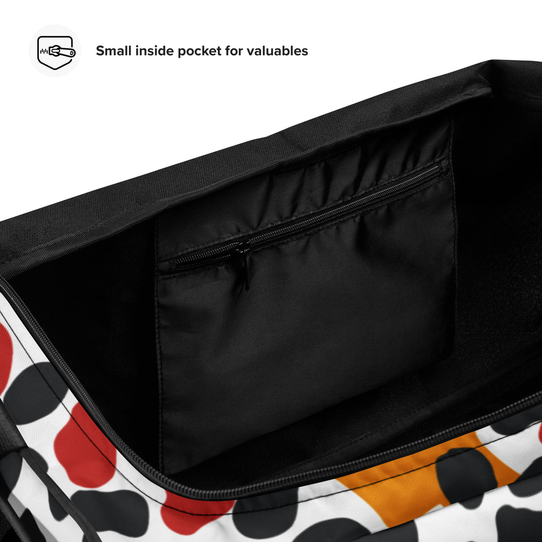 Stylish duffle bag with an abstract print in black, orange, red, and white colors, featuring dual handles and an adjustable strap.