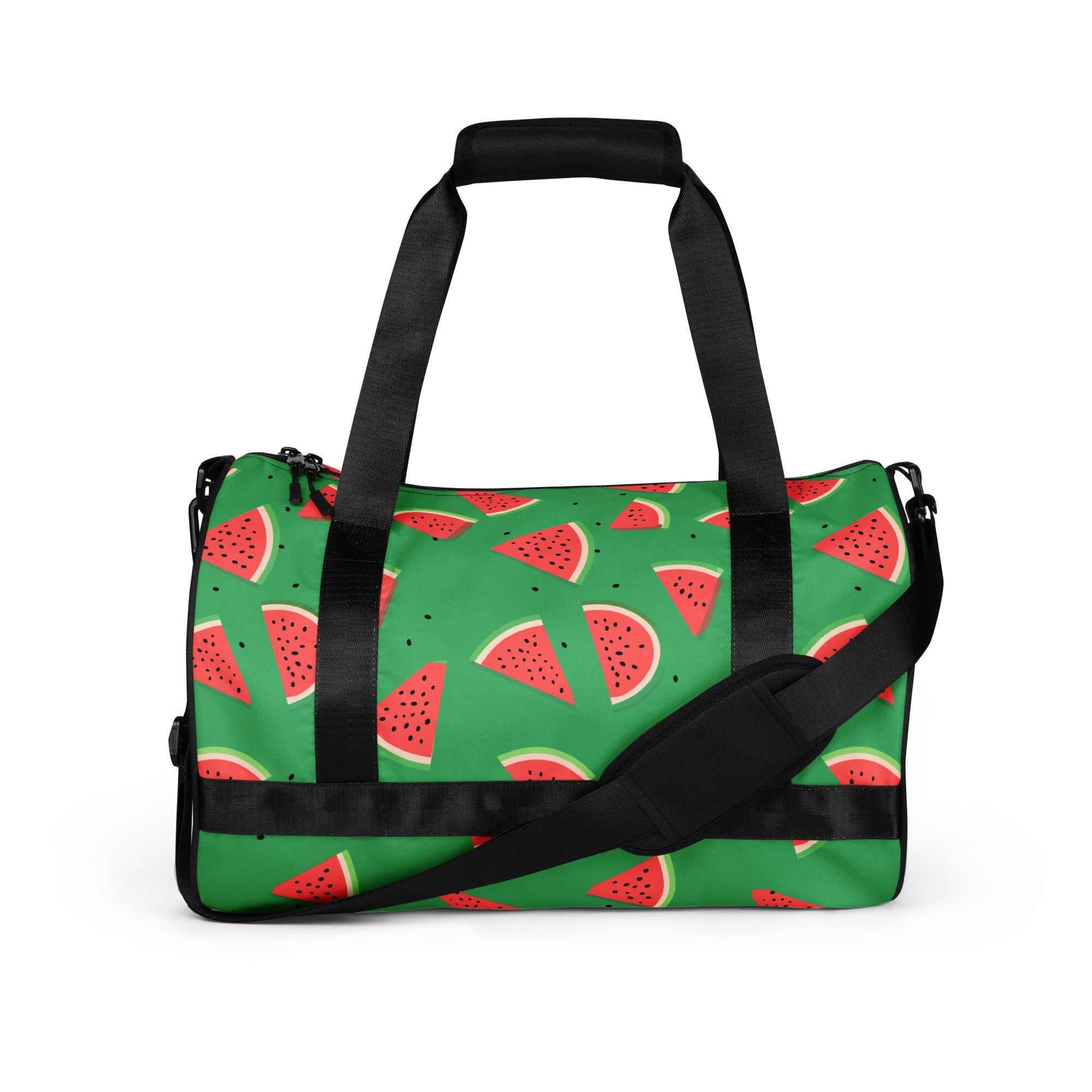 Vibrant watermelon print gym bag on a green background with black handles.