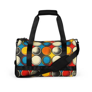 Vibrant circle print gym bag featuring a colorful design with red, yellow, blue, and black circles against a black background.