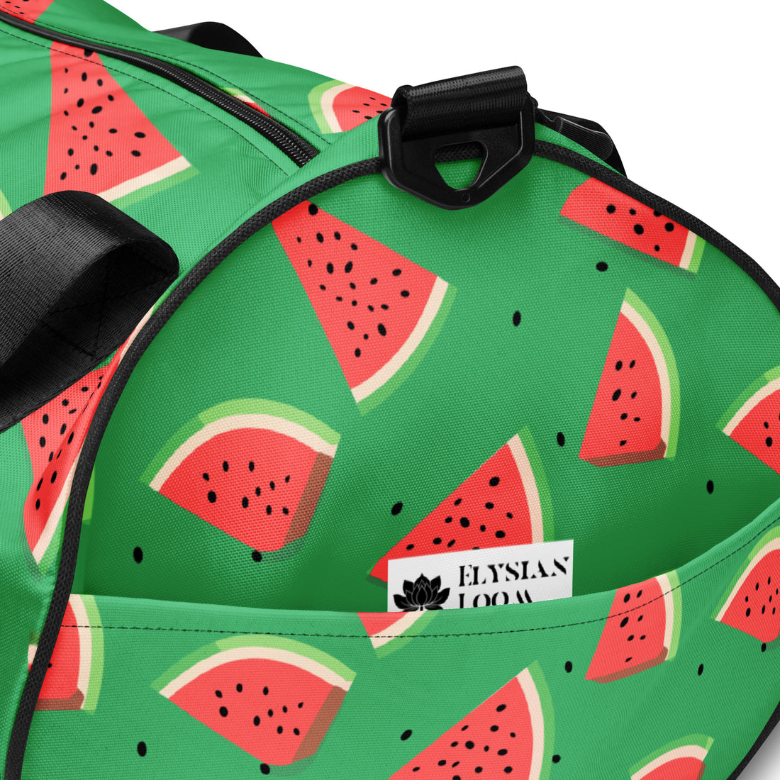 Vibrant watermelon print gym bag on a green background with black handles.