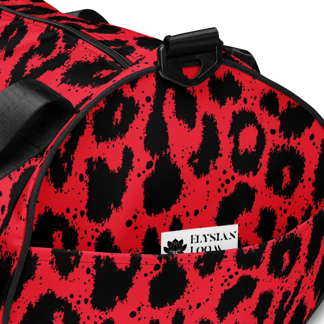 Bold leopard print gym bag in red and black, featuring dual padded handles and a crossbody strap.