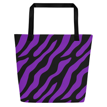 Vibrant purple zebra print tote bag with black handles, perfect for the beach or daily use.