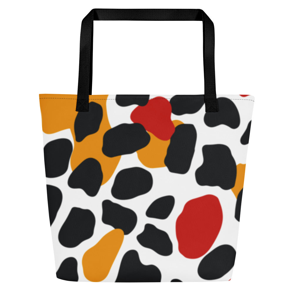 Vibrant abstract pattern large tote bag featuring bold colors including black, orange, red, and white, ideal for beach outings.