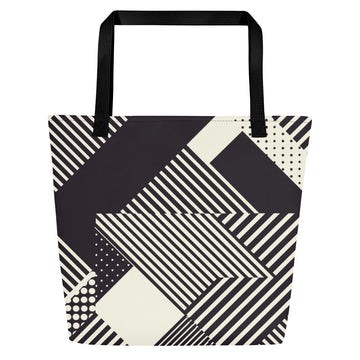 Geometric striped large tote bag in black and cream color with bold patterns.