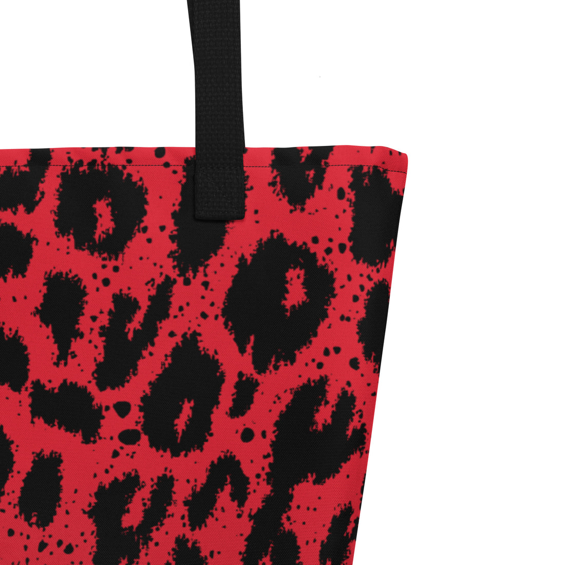 Vibrant red leopard print large tote bag with black handles, perfect for beach outings.