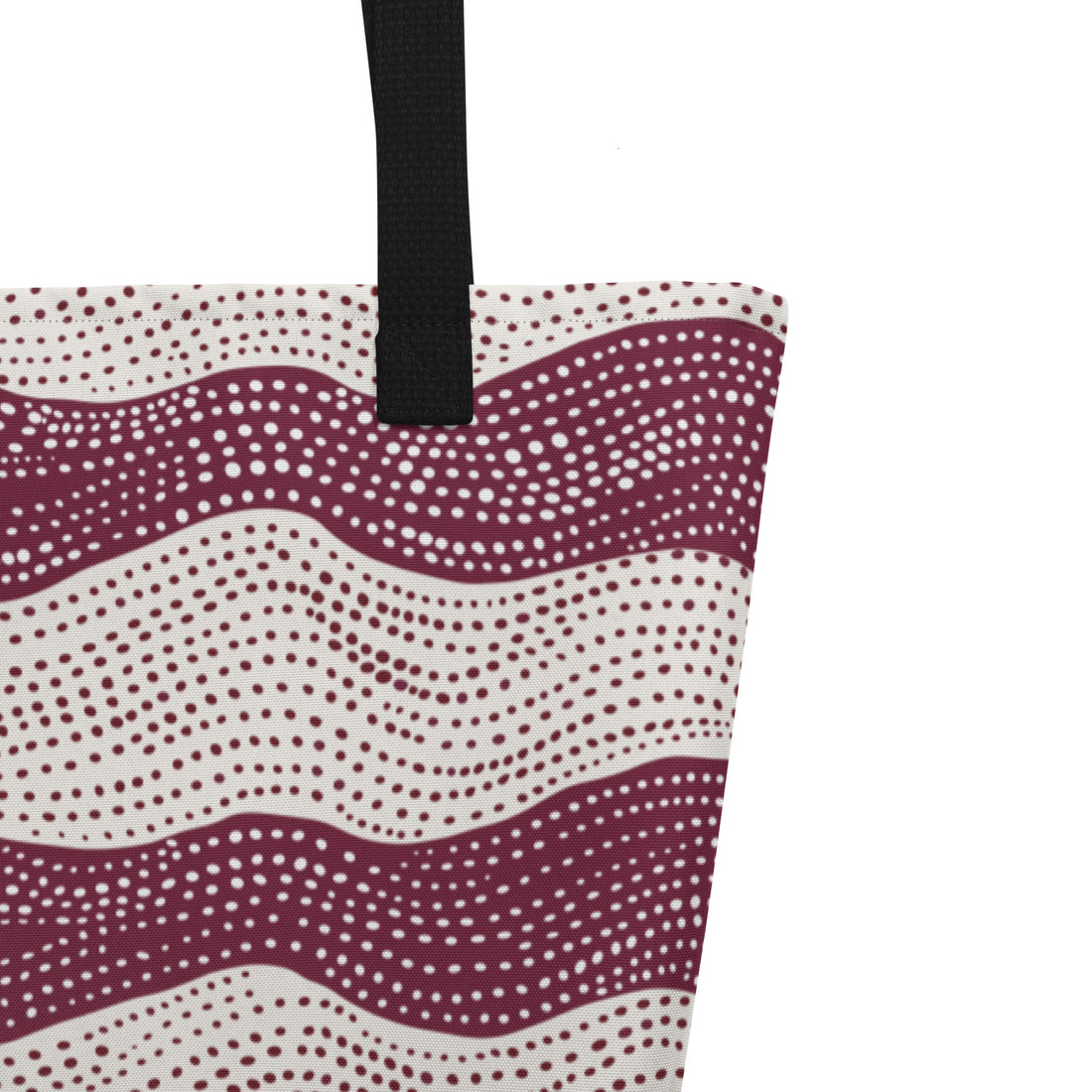 Large tote bag with a stylish red wavy pattern on cream background and black handles.