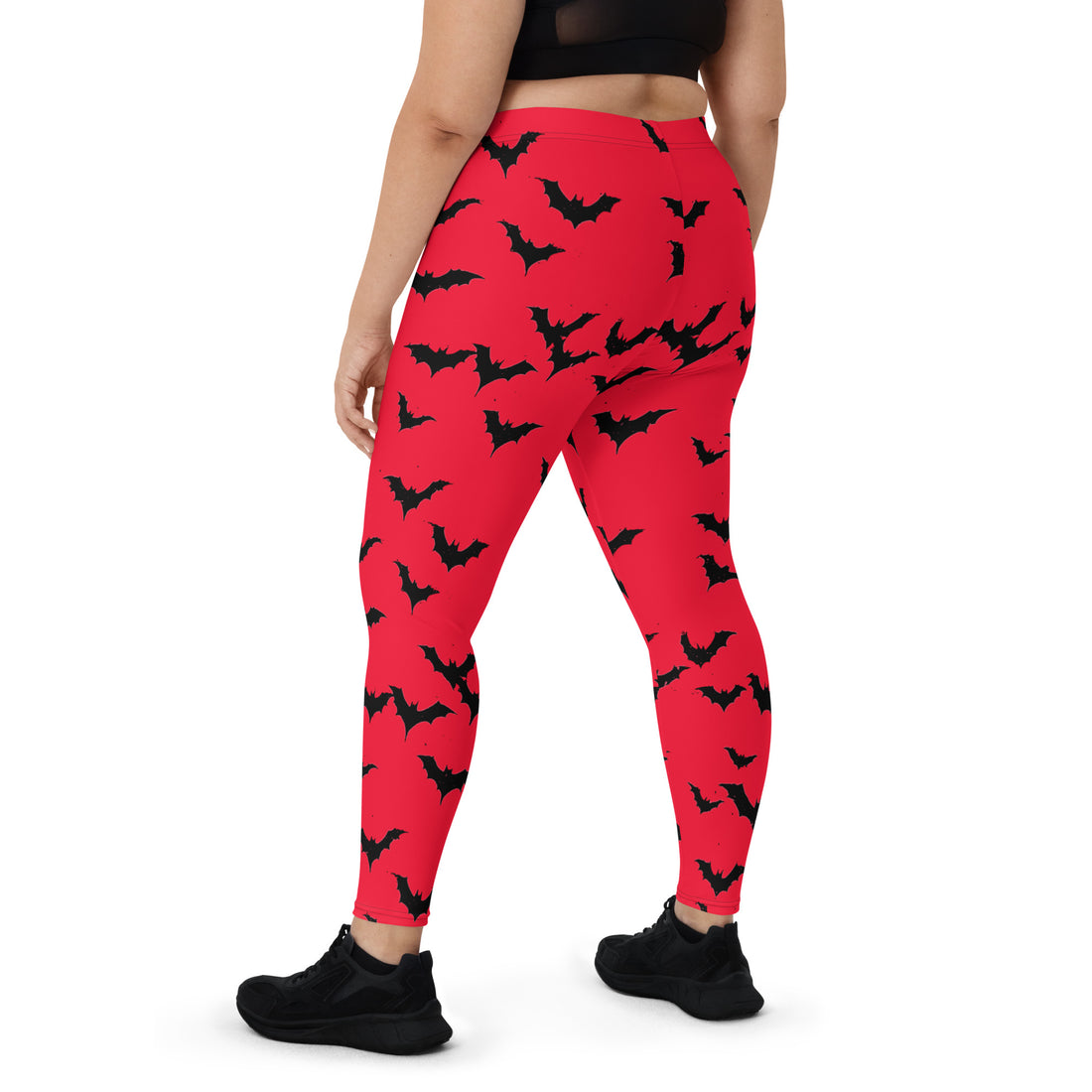 Red leggings with black bat print, designed for Halloween fashion for women.