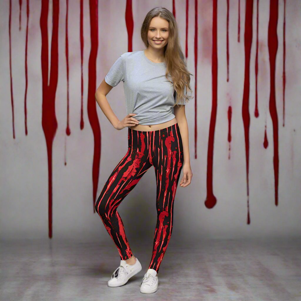 Blood-spattered leggings in red and black, stylish women's fashion, perfect for Halloween.