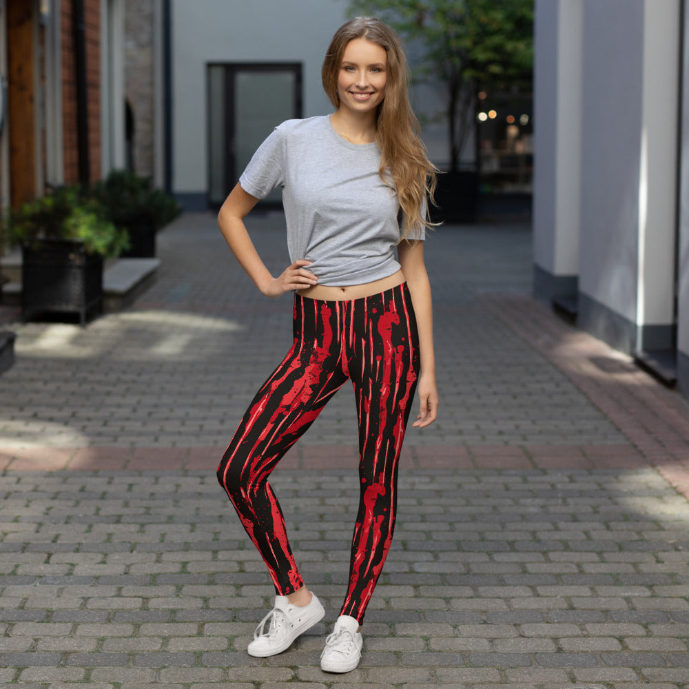 Halloween themed leggings for women with a bloody stripe design in red and black.