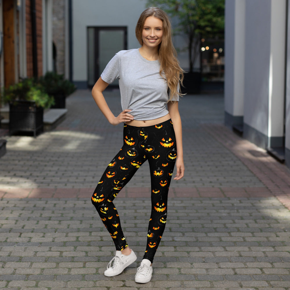 Halloween Pumpkin Print Leggings for Women, featuring bright orange pumpkins on a black background.