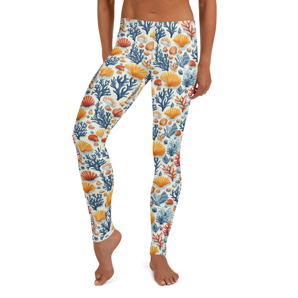 Ocean coral and seashell patterned leggings showcasing blue, red, and orange marine motifs, perfect for winter fashion.