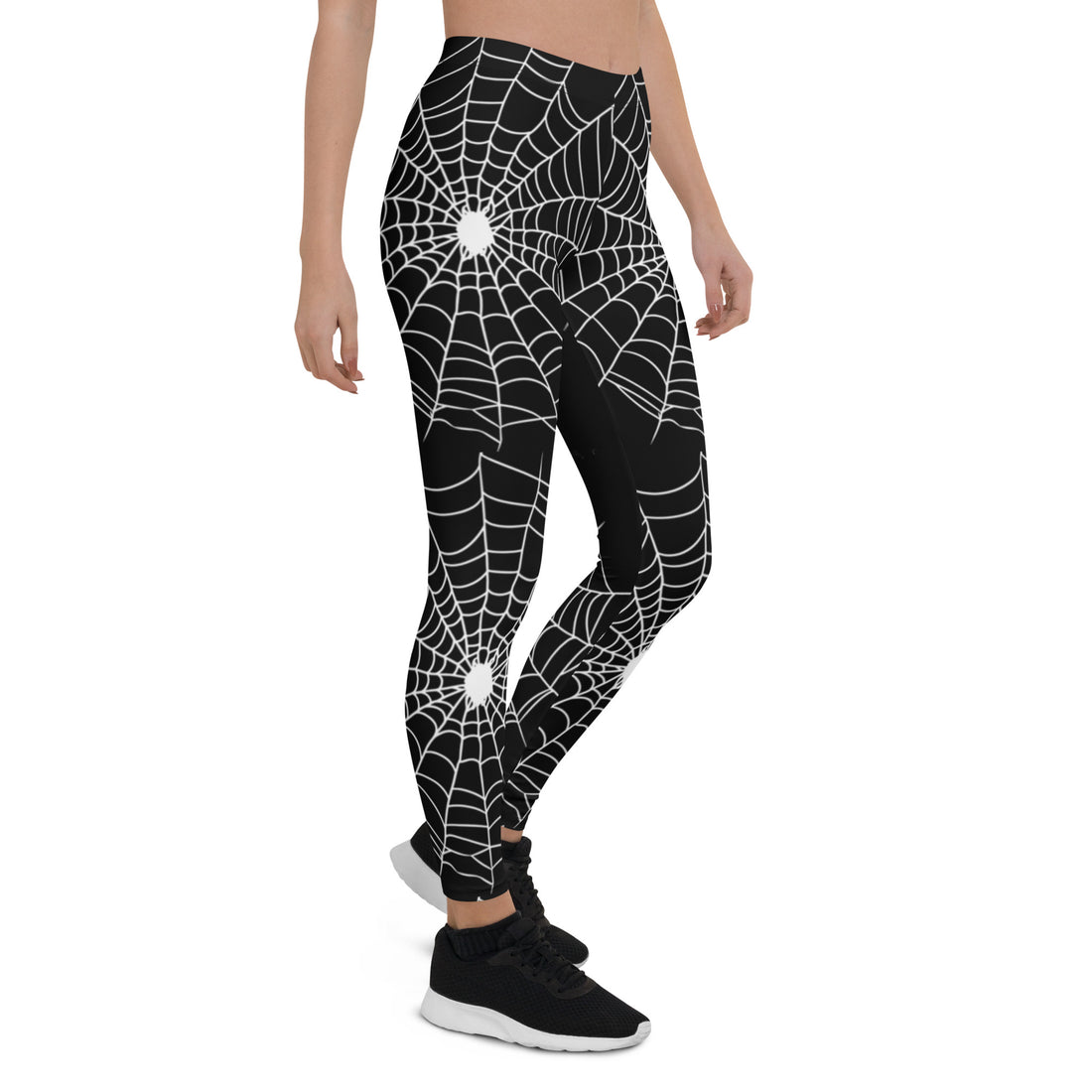 Black leggings with white spider web design, perfect for Halloween.