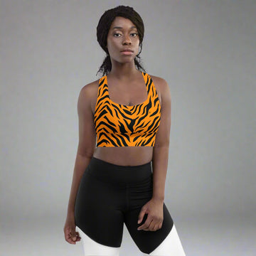 Orange and black tiger print longline sports bra for women.