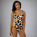 Trendy abstract print one-piece swimsuit featuring bold colors and a flattering design.