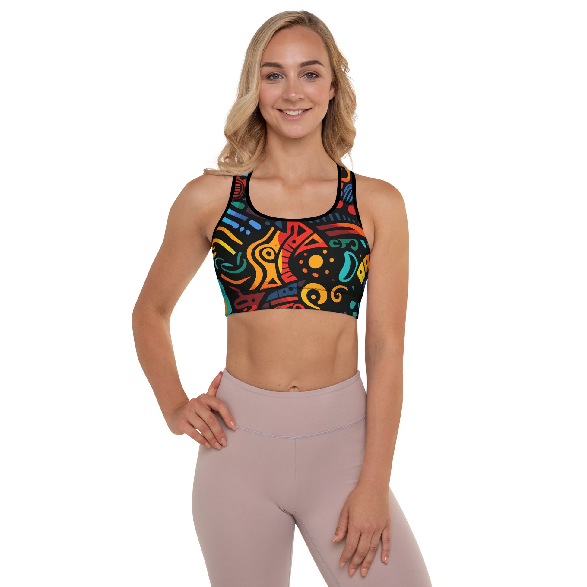 Vibrant padded sports bra featuring a colorful abstract design on a woman.