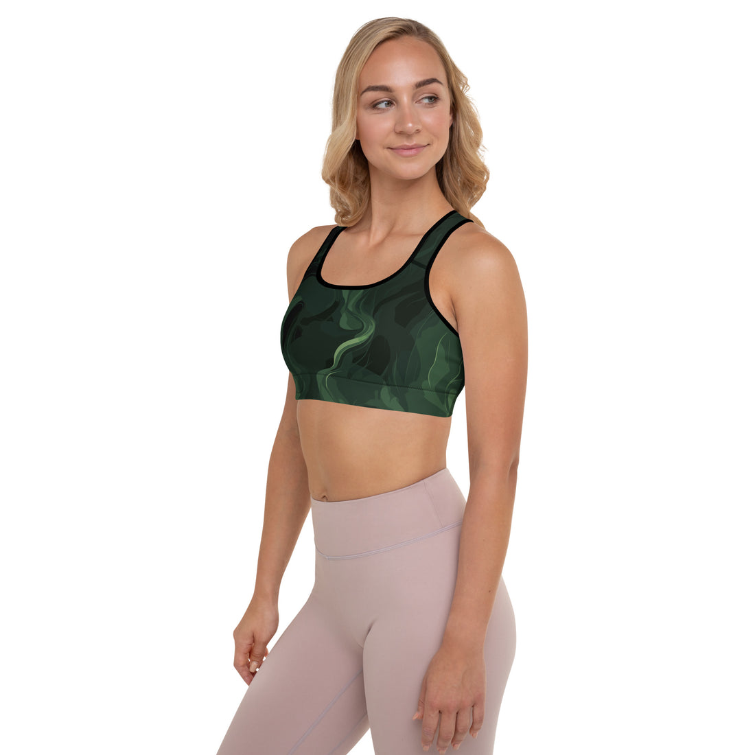 Fabulous green marble padded sports bra on a woman, stylish and comfortable for workouts.