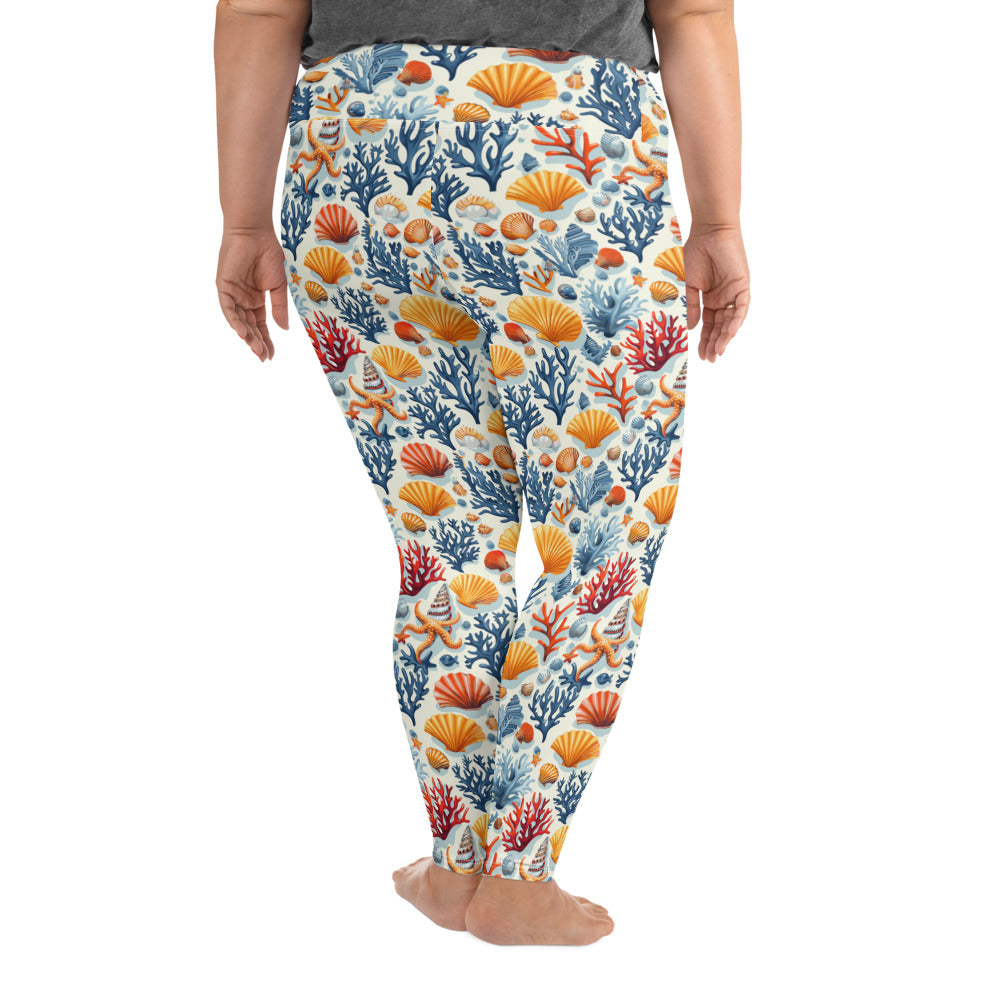 Plus size leggings with oceanic coral and seashell pattern in vibrant blue and orange colors, high waistband, optimal for comfort and style.