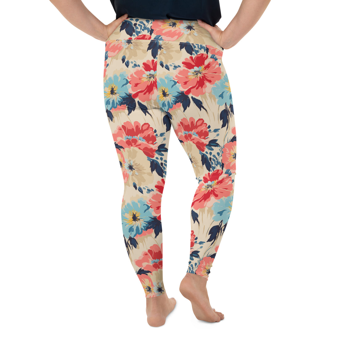 Plus size leggings with vibrant floral design featuring coral, navy, and turquoise flowers.