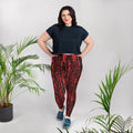 Plus size leggings with a spooky splatter print in red and black, with a high waistband, designed for comfort and style.