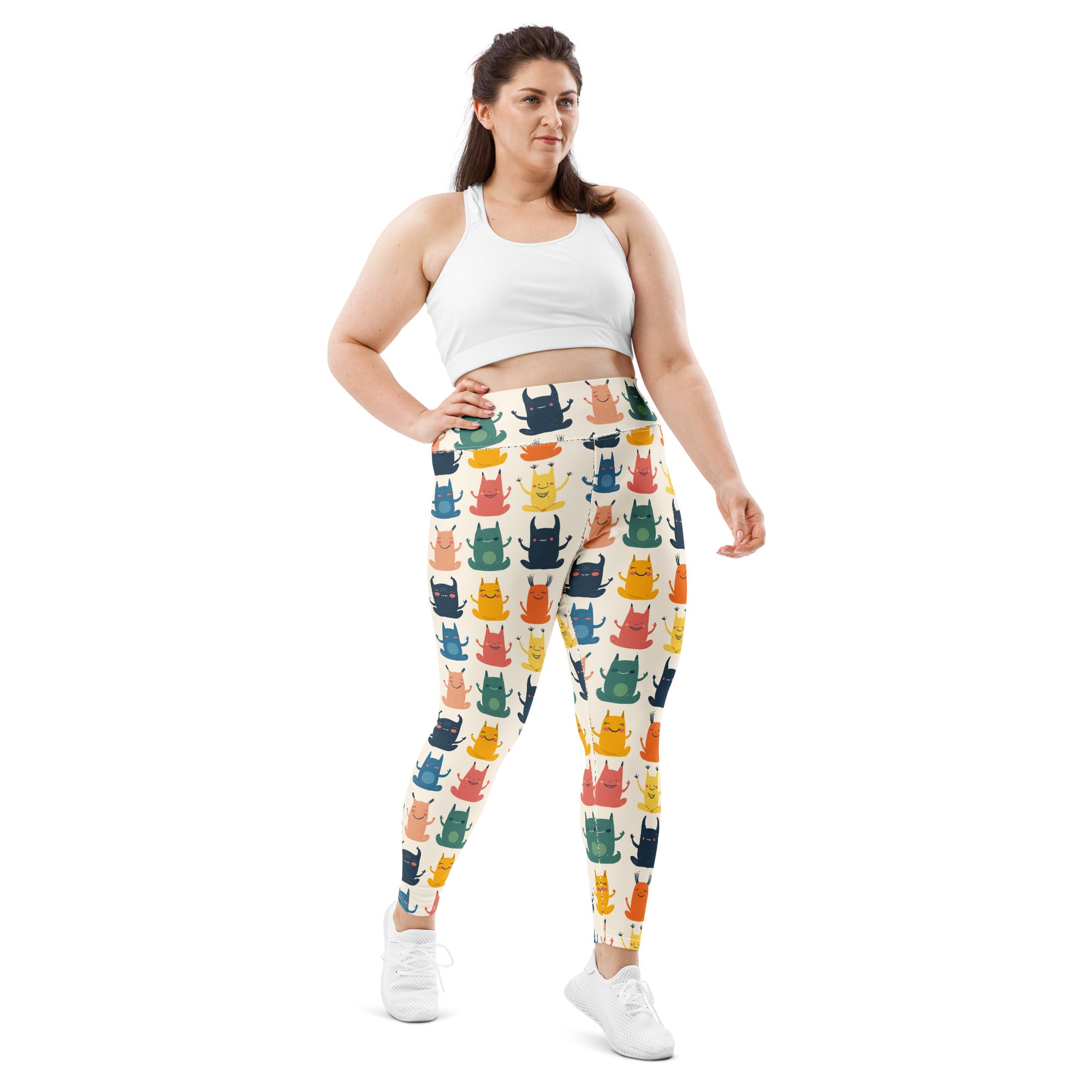 Plus size Halloween-themed leggings featuring whimsical monster prints in vibrant colors.