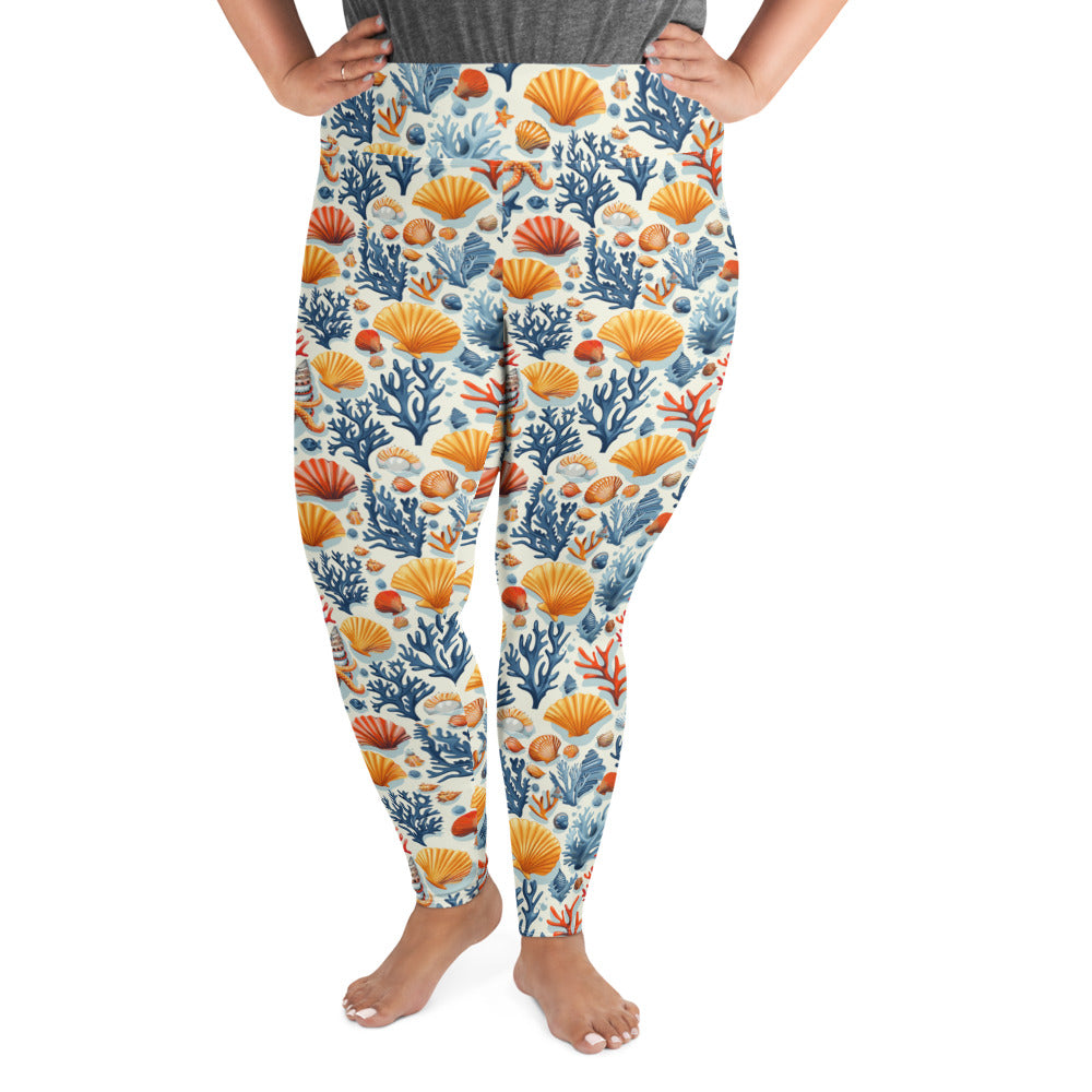 Plus size leggings with oceanic coral and seashell pattern in vibrant blue and orange colors, high waistband, optimal for comfort and style.